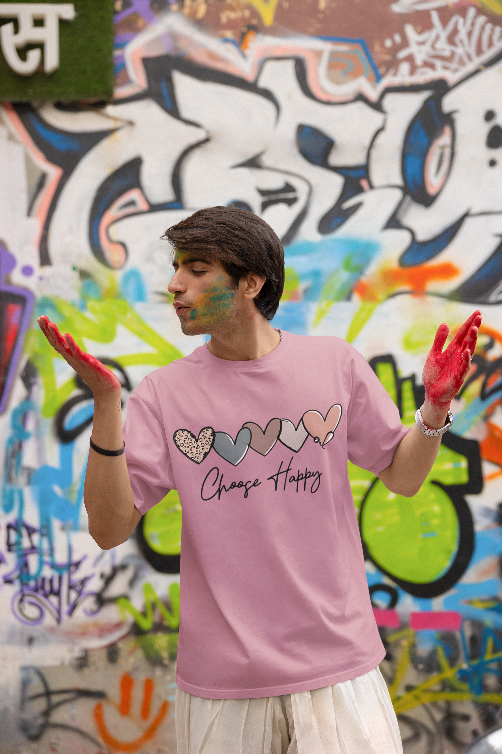 Front view of W.I.F.I (Wear it Feel it) Men’s Terry Oversized "Choose Happy" Graphic Premium Cotton T-Shirt in pink model