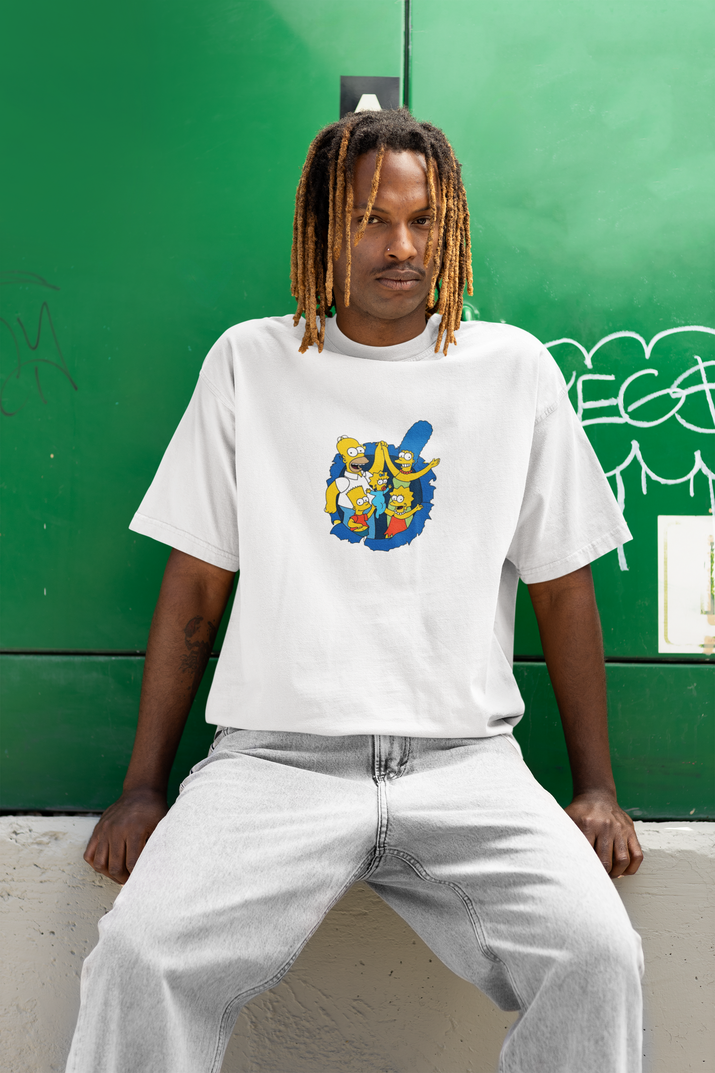 Model wearing the W.I.F.I Men's Oversized "The Simpsons" Graphic Premium Cotton White T-Shirt.