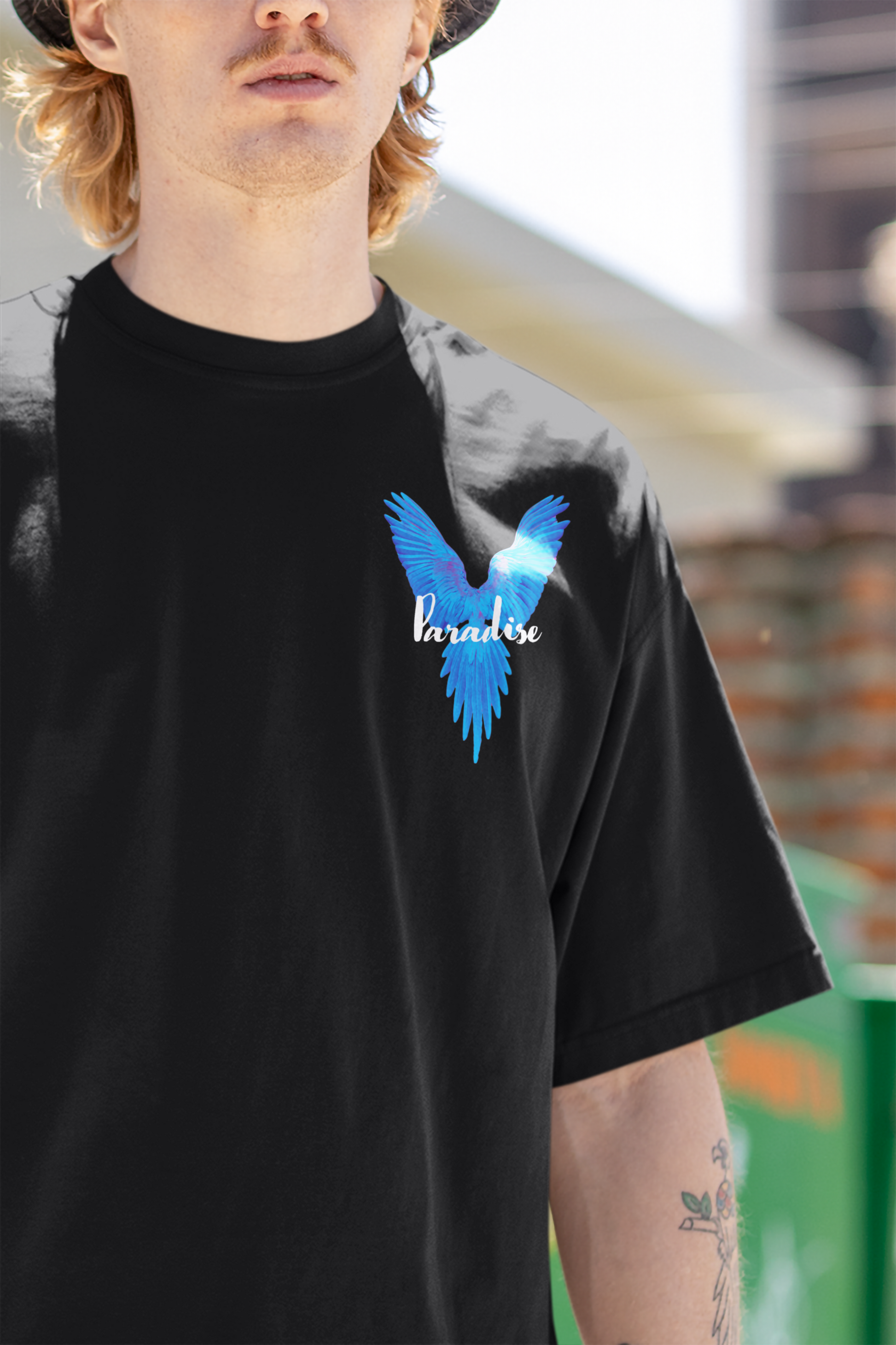 Close-up detail of the graphic design on the W.I.F.I Men's "Paradise Blue Wings" T-Shirt