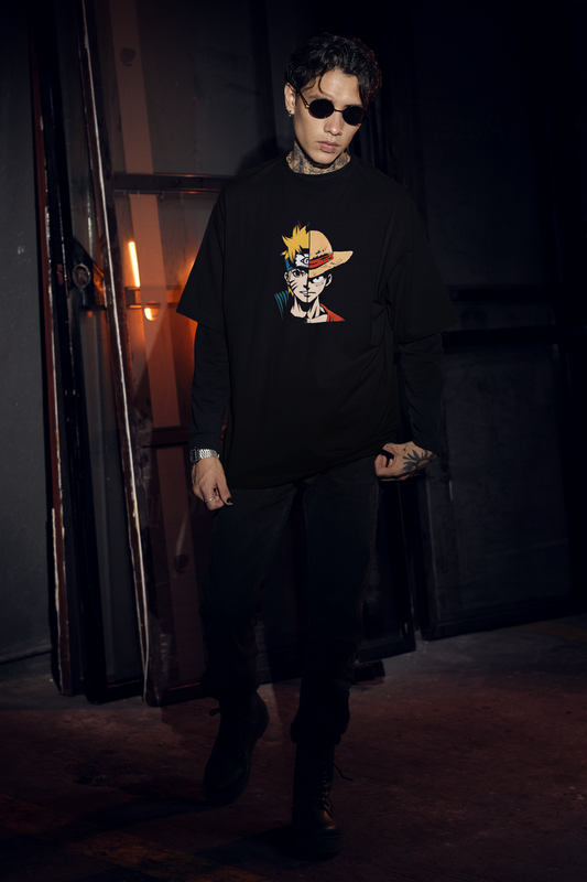 Model wearing W.I.F.I Men's Oversized One Piece Anime Inspired Graphic T-Shirt in a casual setting.