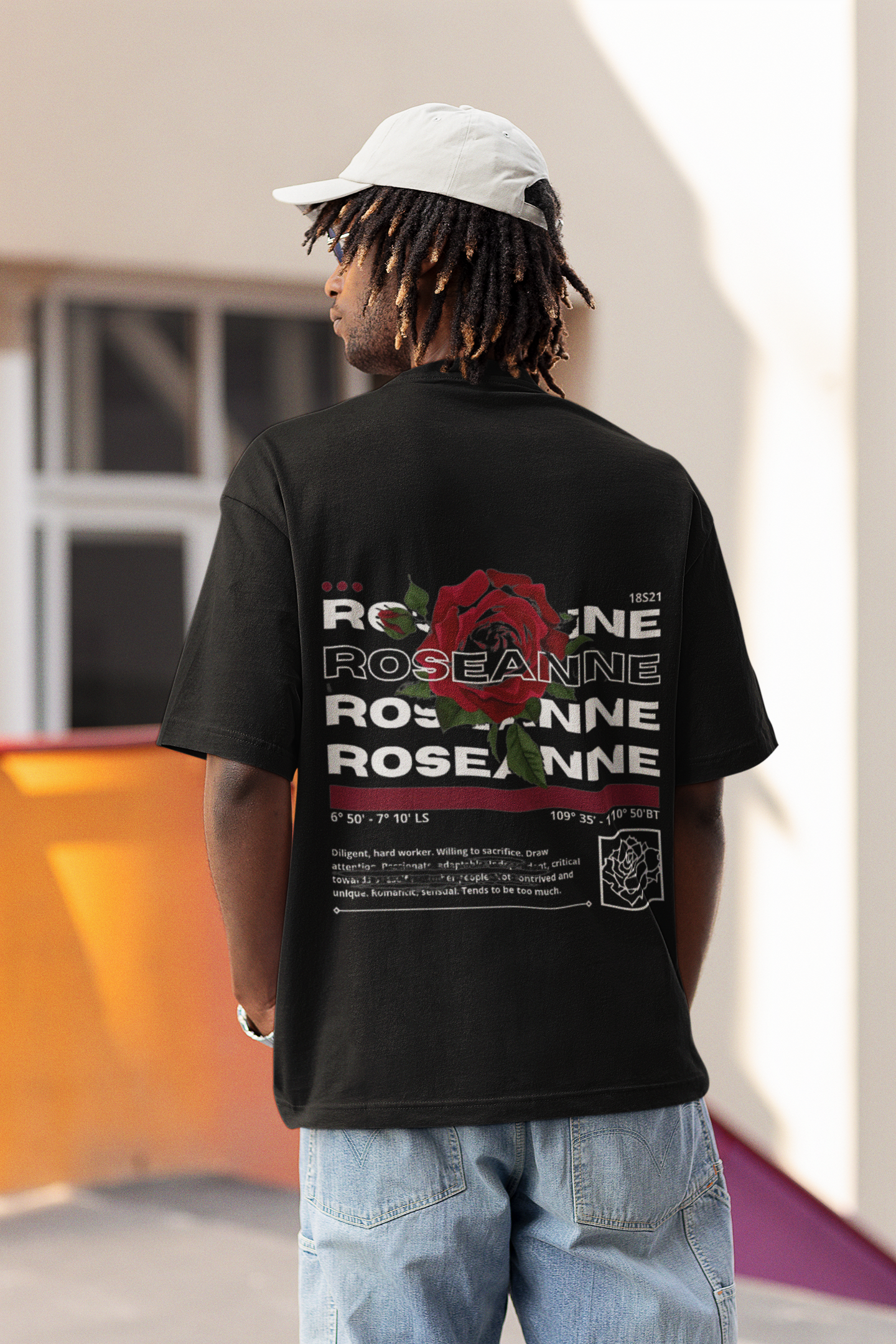 Close-up details of the graphic on W.I.F.I Men's Oversized 'Red Rose' Black T-Shirt.